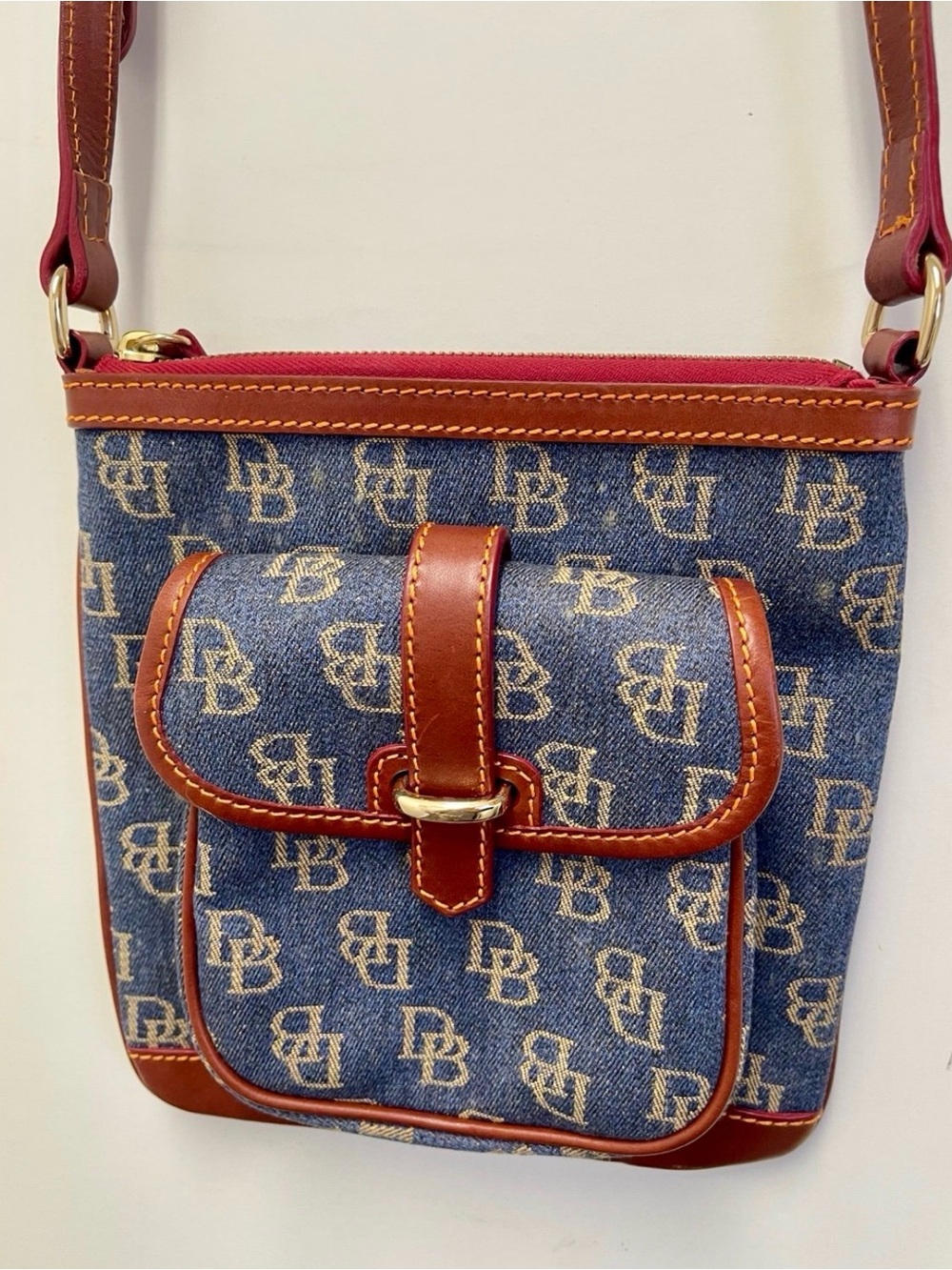 Dooney & Bourke Blue Denim Monogram Crossbody with Brown Trim and Red Zip